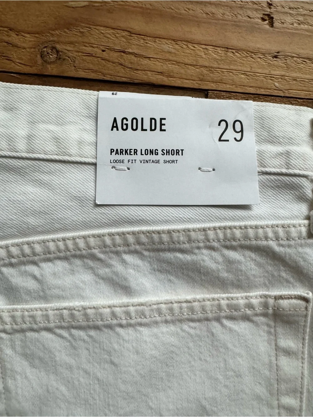 Agolde Parker Long Jean Shorts in Panna Cotta.